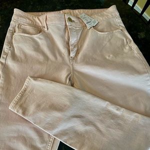 Skinny jean lots of stretch.  Light shell pink